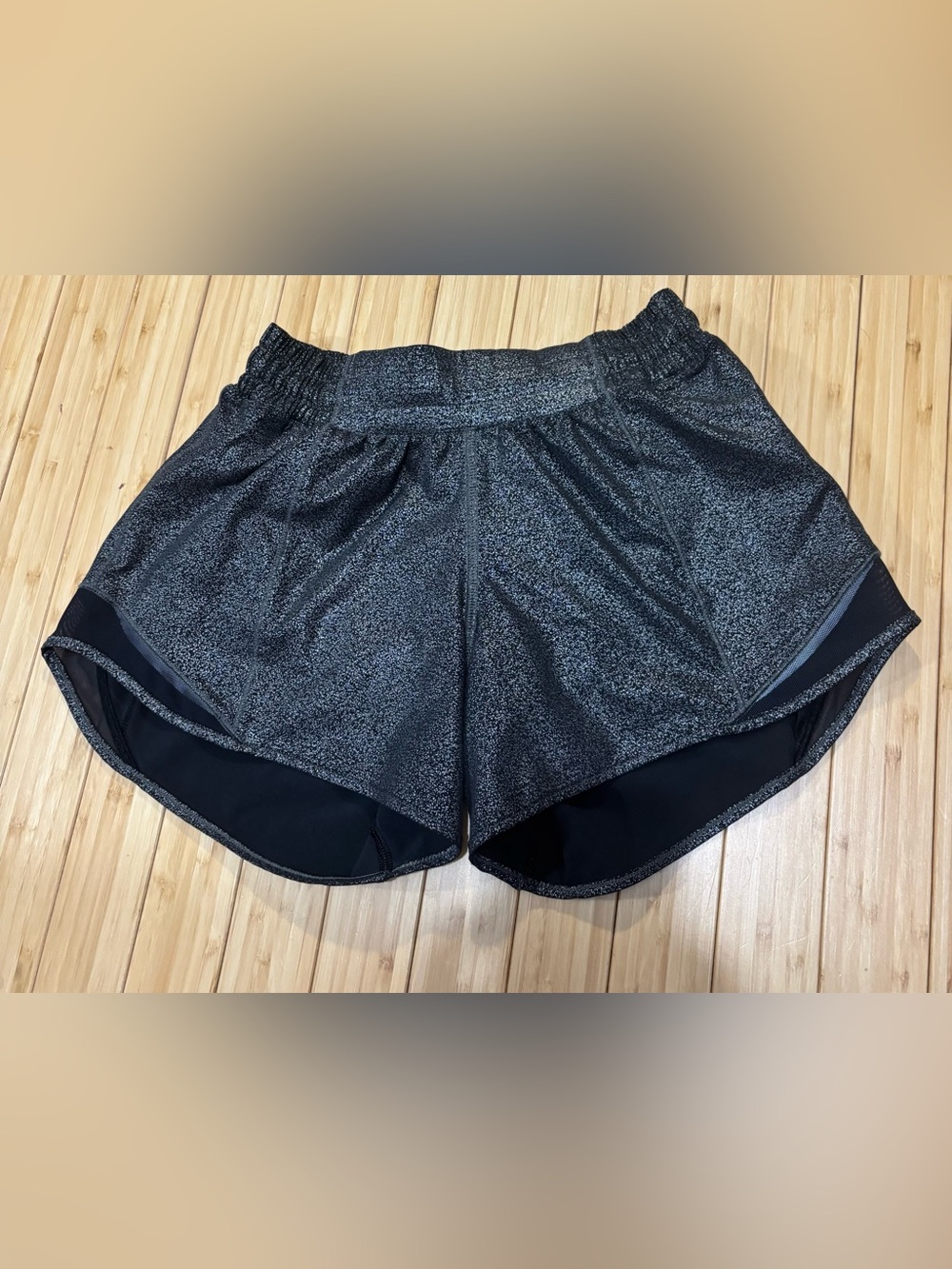 Lululemon Hotty Hot Shorts. Silver/black shimmer. Size 4 tall. Good condition.